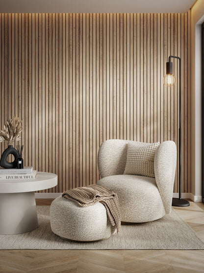 Multipanel Bleached Cuneo Oak on display with a chair and a table on display with our beautiful wall panels on display - The Wall Works