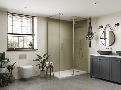 Multipanel Large Tile Sage Green - shower panels on display in a shower with matching gold shower accessories, with a toilet to the left-hand side and a bathroom cabinet with 2 sinks on top of it, matching the shower panels - wall panels - The wall Works