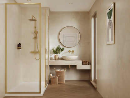 Multipanel Unlipped Marfil Cream on display in a bathroom as shower panels matching the gold shower door, and a big mirror mounted onto the shower panels with a big bathroom wall mounted cabinet - wall panels - The Wall Works