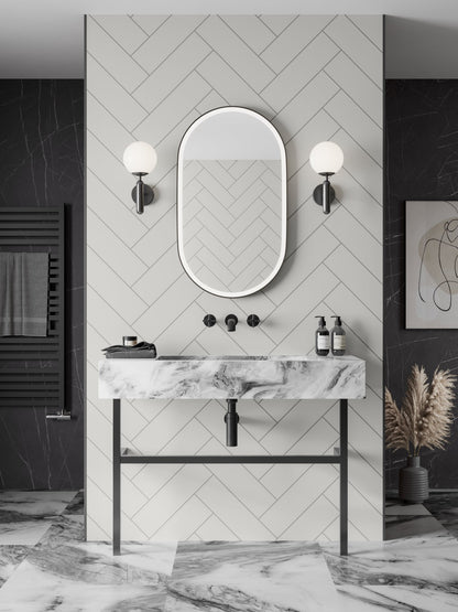 Multipanel White Grey Herringbone shower panels on display in a bathroom with a sink, mirror, and 2 lights on either side of the mirror to match the white wall panels to the whole bathroom - wall panels - The Wall Works  
